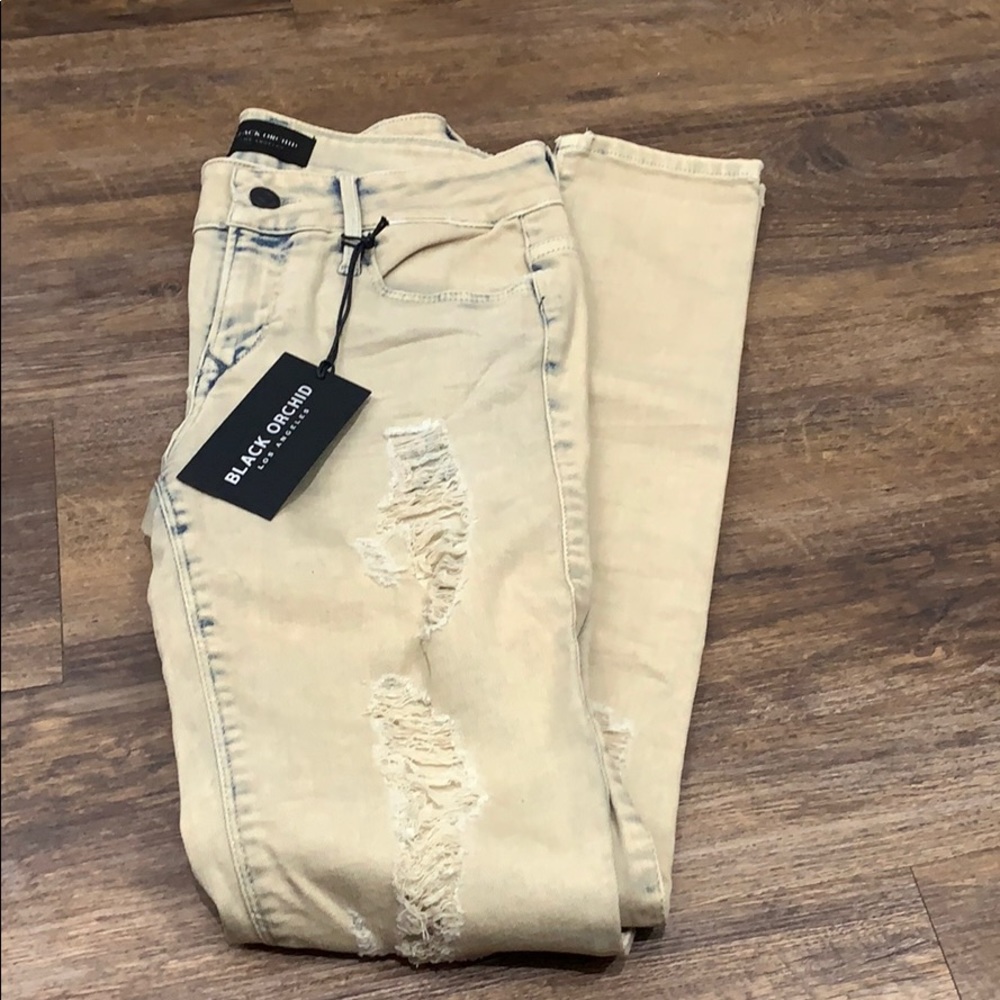 Black Orchid size 26 distressed skinny leg jeans